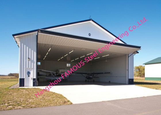 Puertas industriales plegables superiores con panel sandwich de metal duro