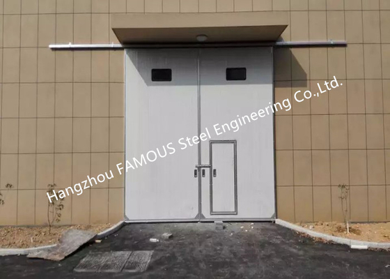 Puertas de garaje industriales de deslizamiento vertical de grandes aberturas Puertas de deslizamiento motorizadas pesadas con vía de acero